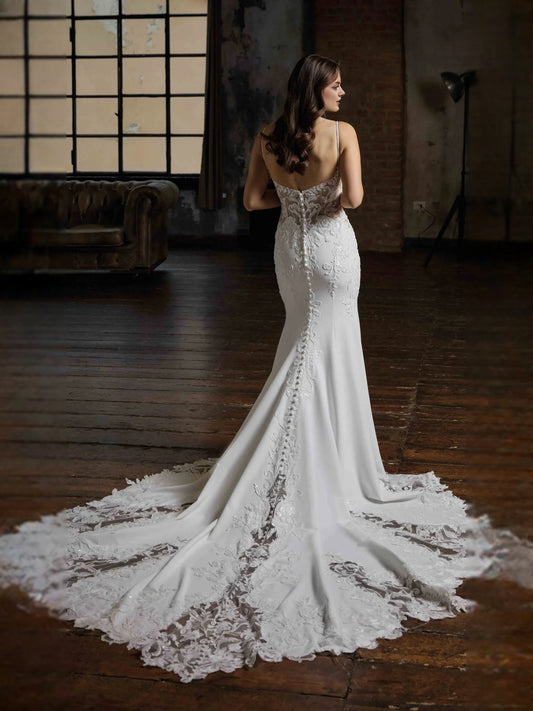 Ivory floor-length wedding dress, front view showing the mermaid silhouette