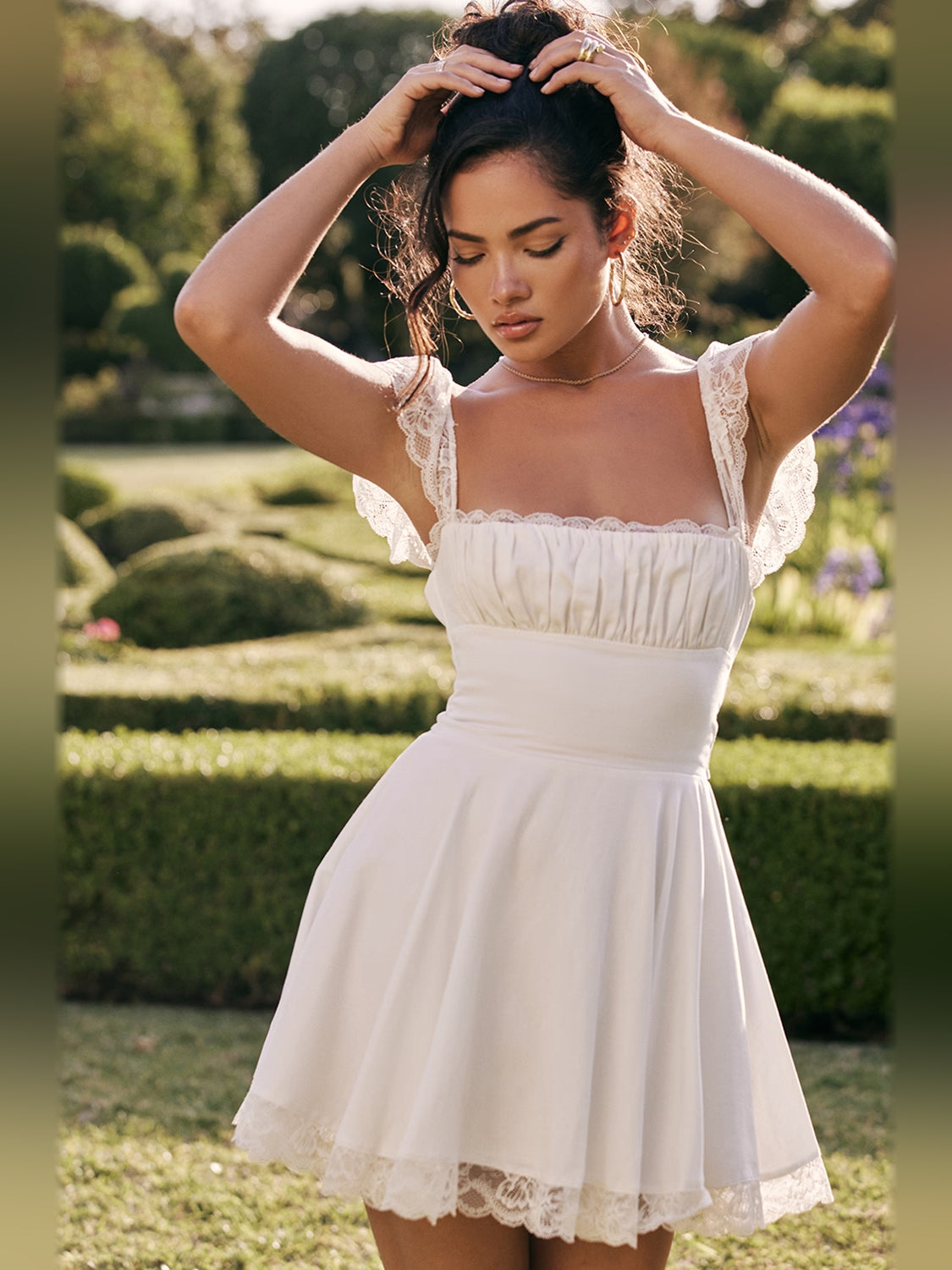 Ivory mini homecoming dress, front view showing the a-line silhouette