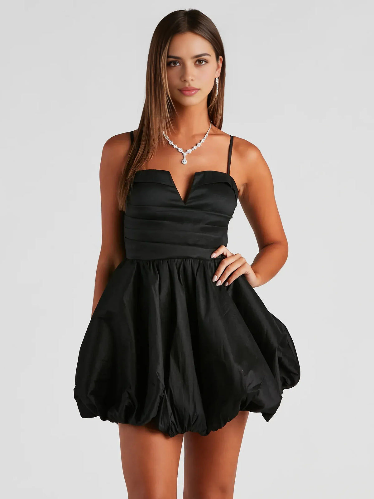 Black mini homecoming dress, alternate view showing the full-length silhouette