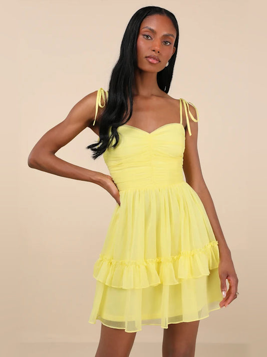 Yellow mini homecoming dress, front view showing the silhouette