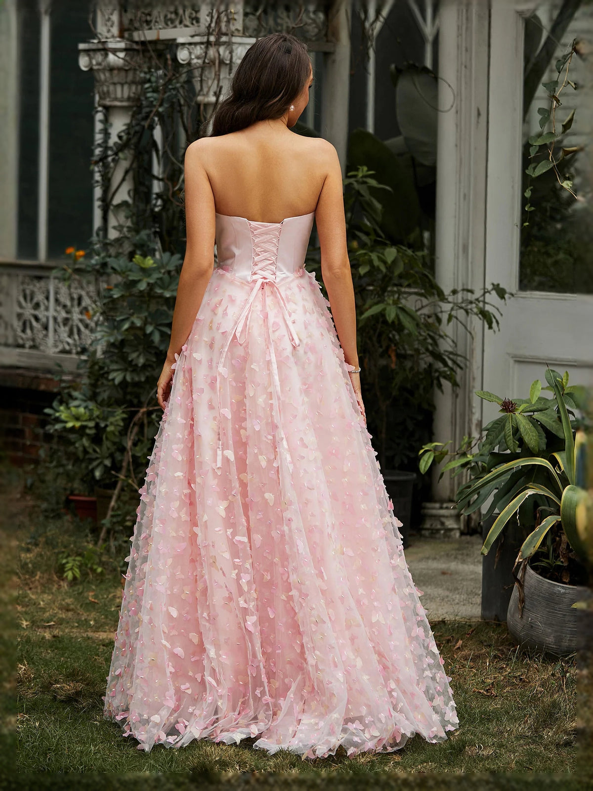 Pink floor-length prom dress, front view showing the ball-gown silhouette