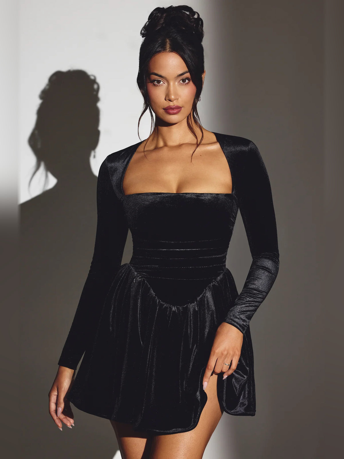 Black mini homecoming dress, front view showing the silhouette