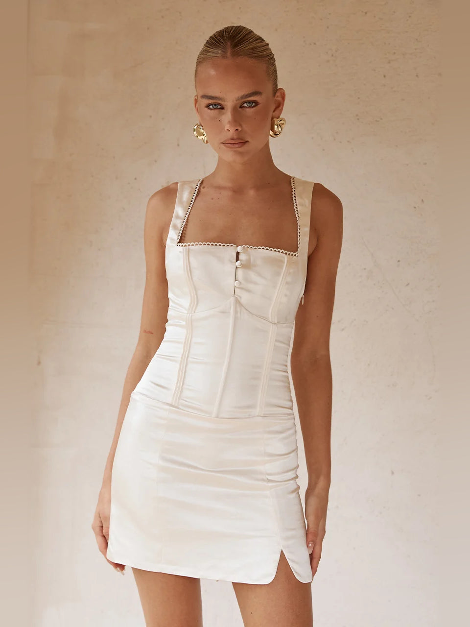 IVORY mini homecoming dress, front view showing the bodycon silhouette