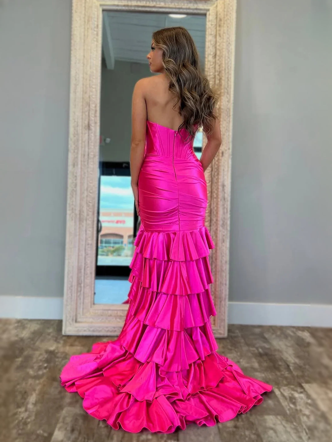 Fuchsia floor-length prom dress, front view showing the mermaid silhouette