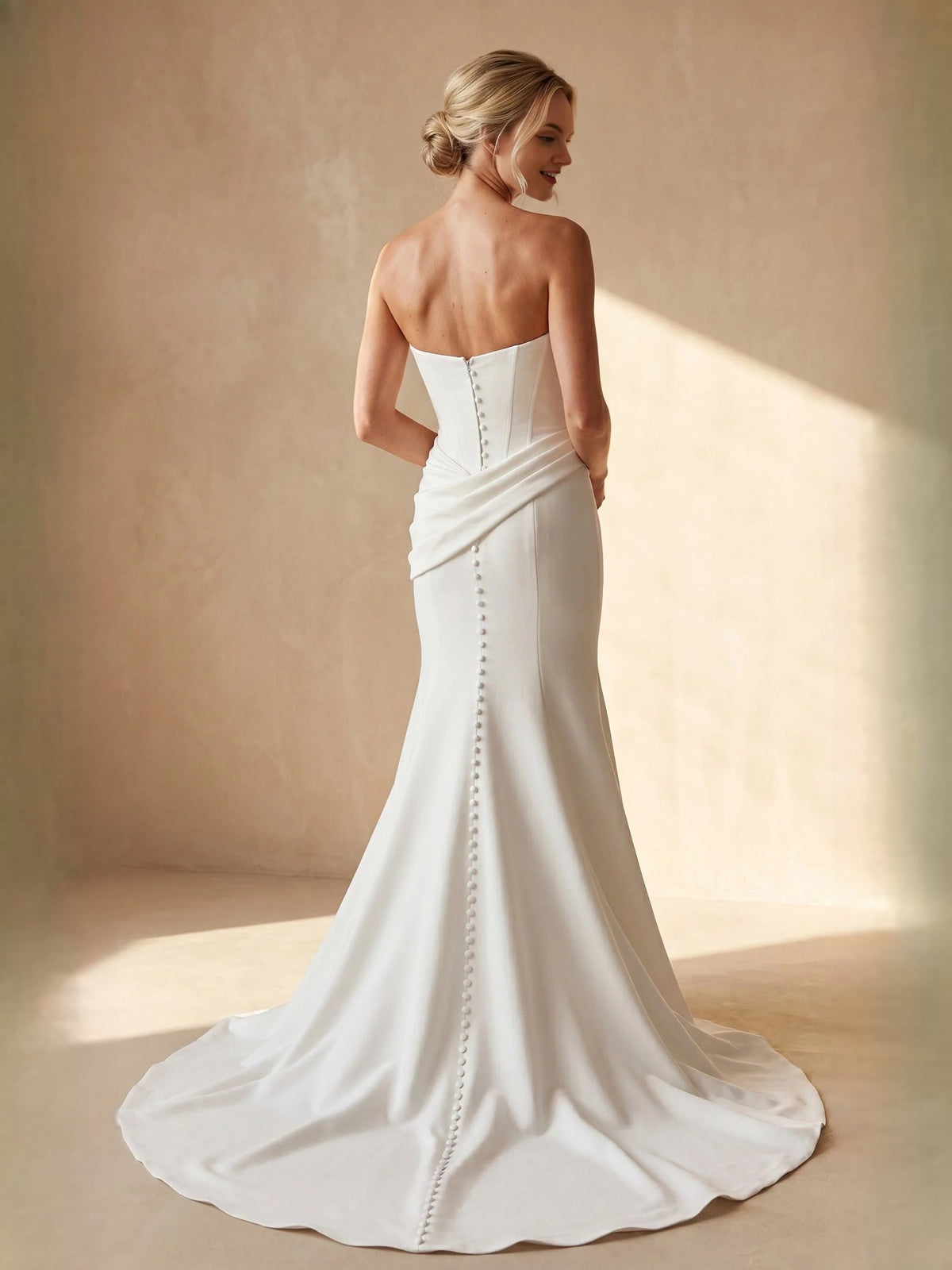 Ivory floor-length wedding dress, front view showing the mermaid silhouette