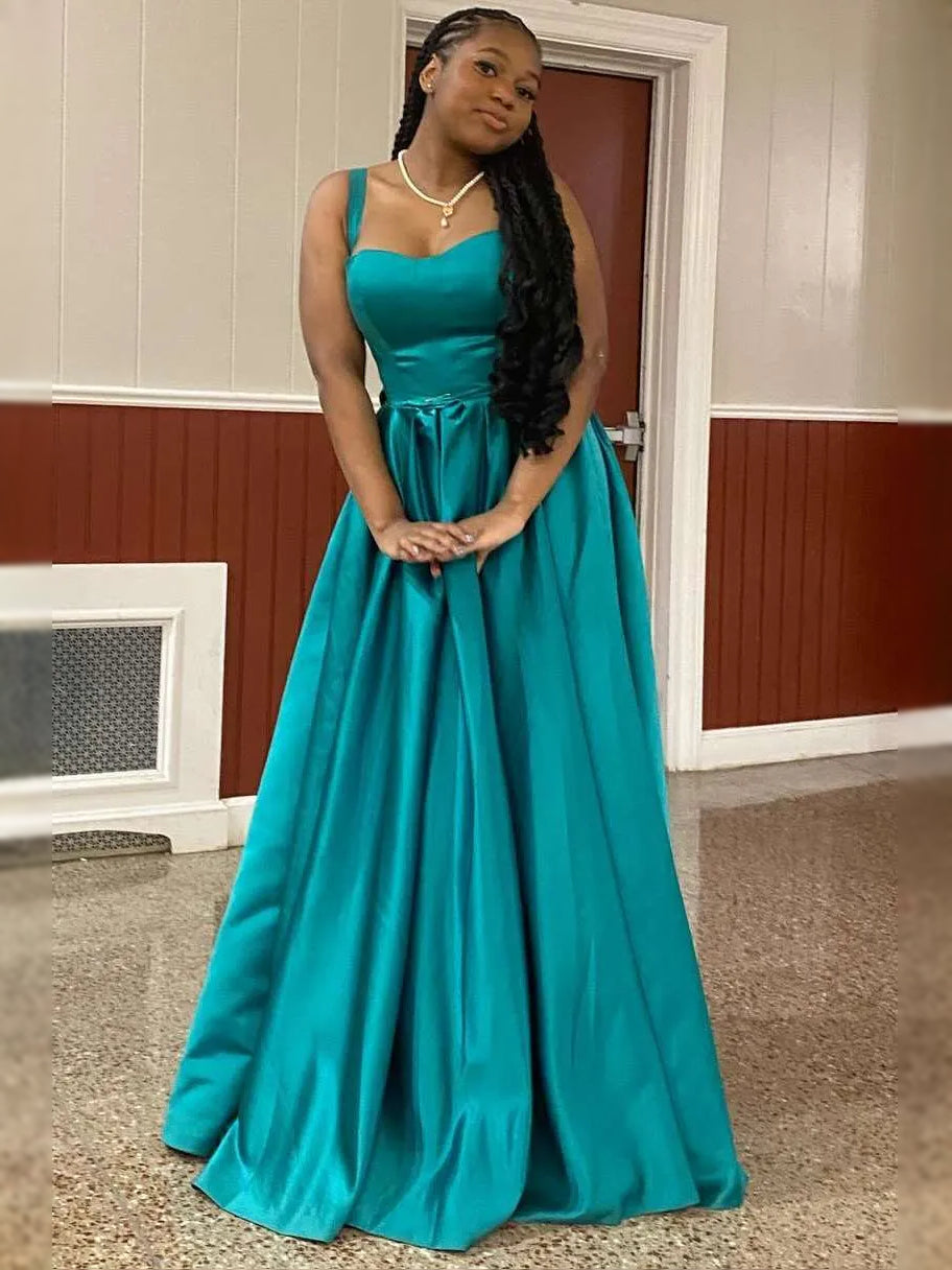 Teal floor-length prom dress, front view showing the ball-gown silhouette