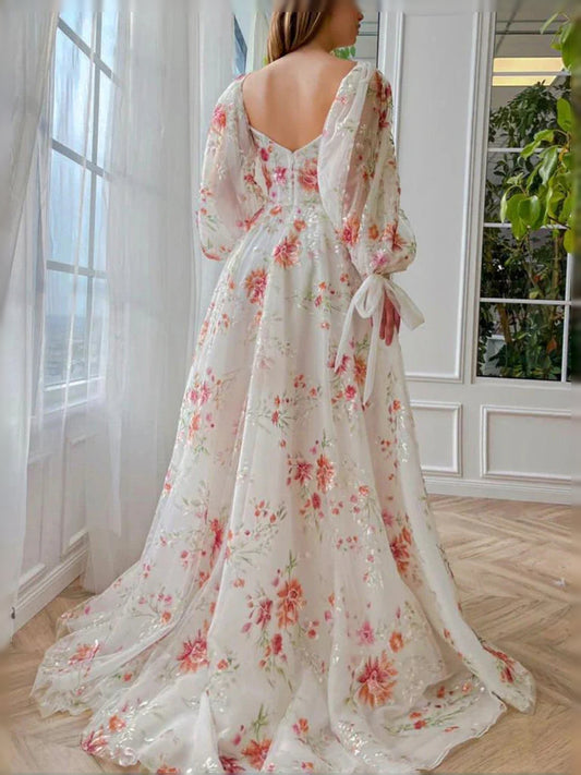 Floral floor-length prom dress, front view showing the a-line silhouette