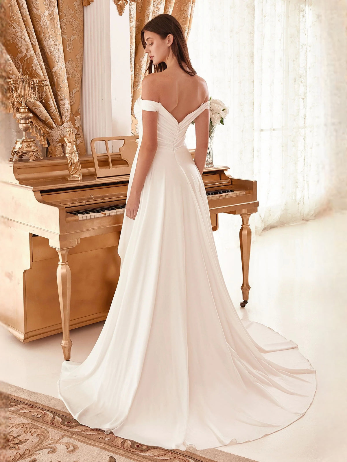 Ivory floor-length wedding dress, front view showing the mermaid silhouette