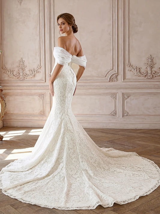 Ivory floor-length wedding dress, front view showing the mermaid silhouette