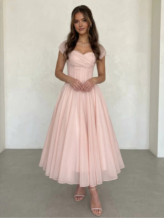 Blush Pink tea-length wedding dress, front view showing the a-line silhouette