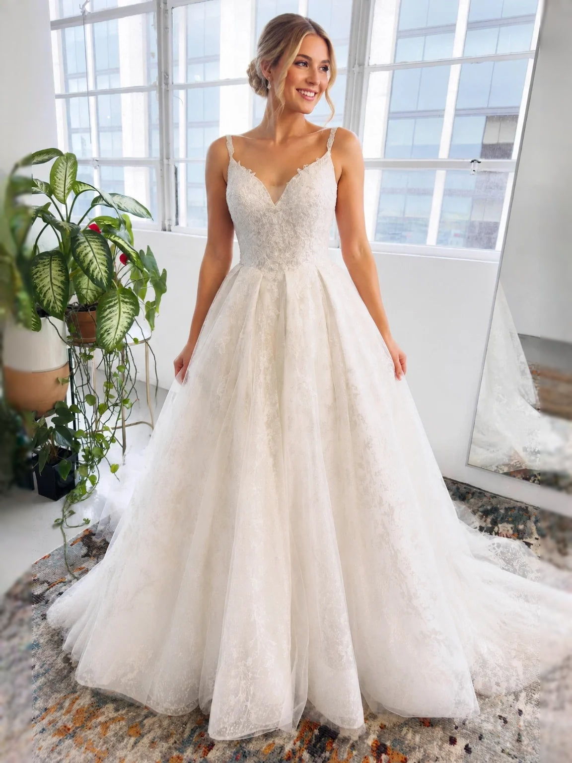 Ivory floor-length wedding dress, front view showing the ball-gown silhouette