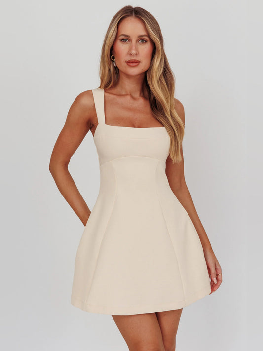 Apricot mini homecoming dress, front view showing the a-line silhouette