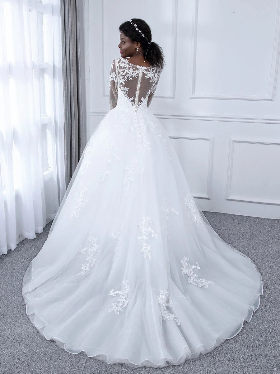 Ivory floor-length wedding dress, front view showing the a-line silhouette