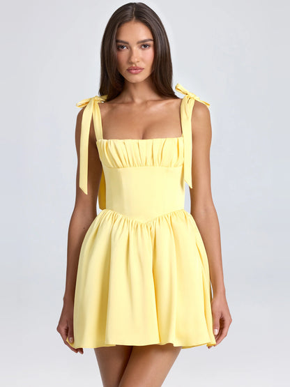Yellow mini homecoming dress, front view showing the silhouette
