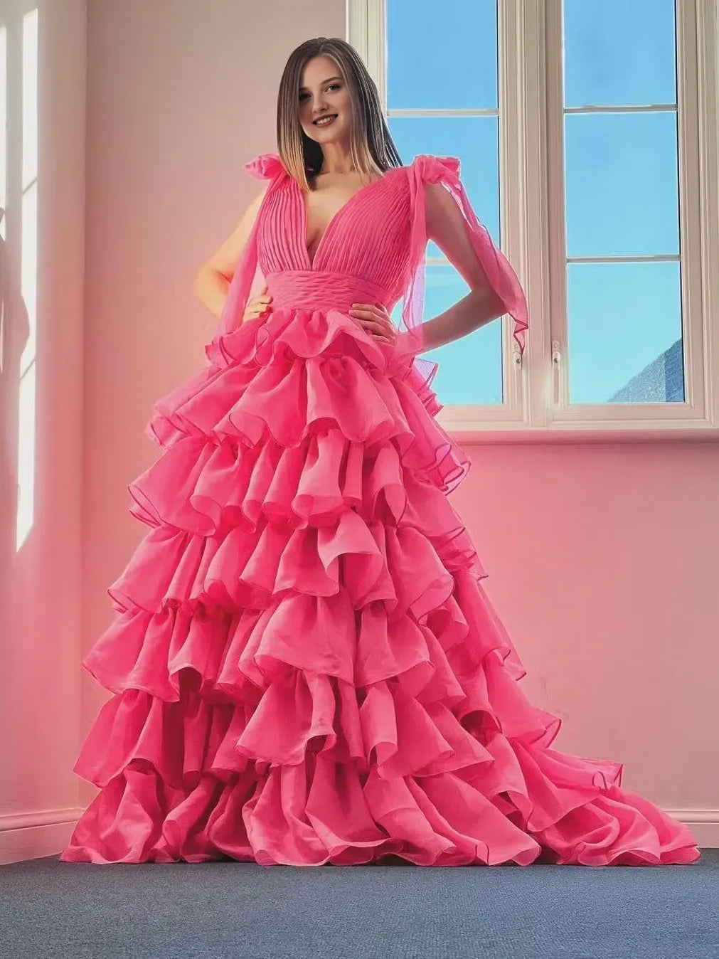 Fuchsia floor-length prom dress, front view showing the a-line silhouette