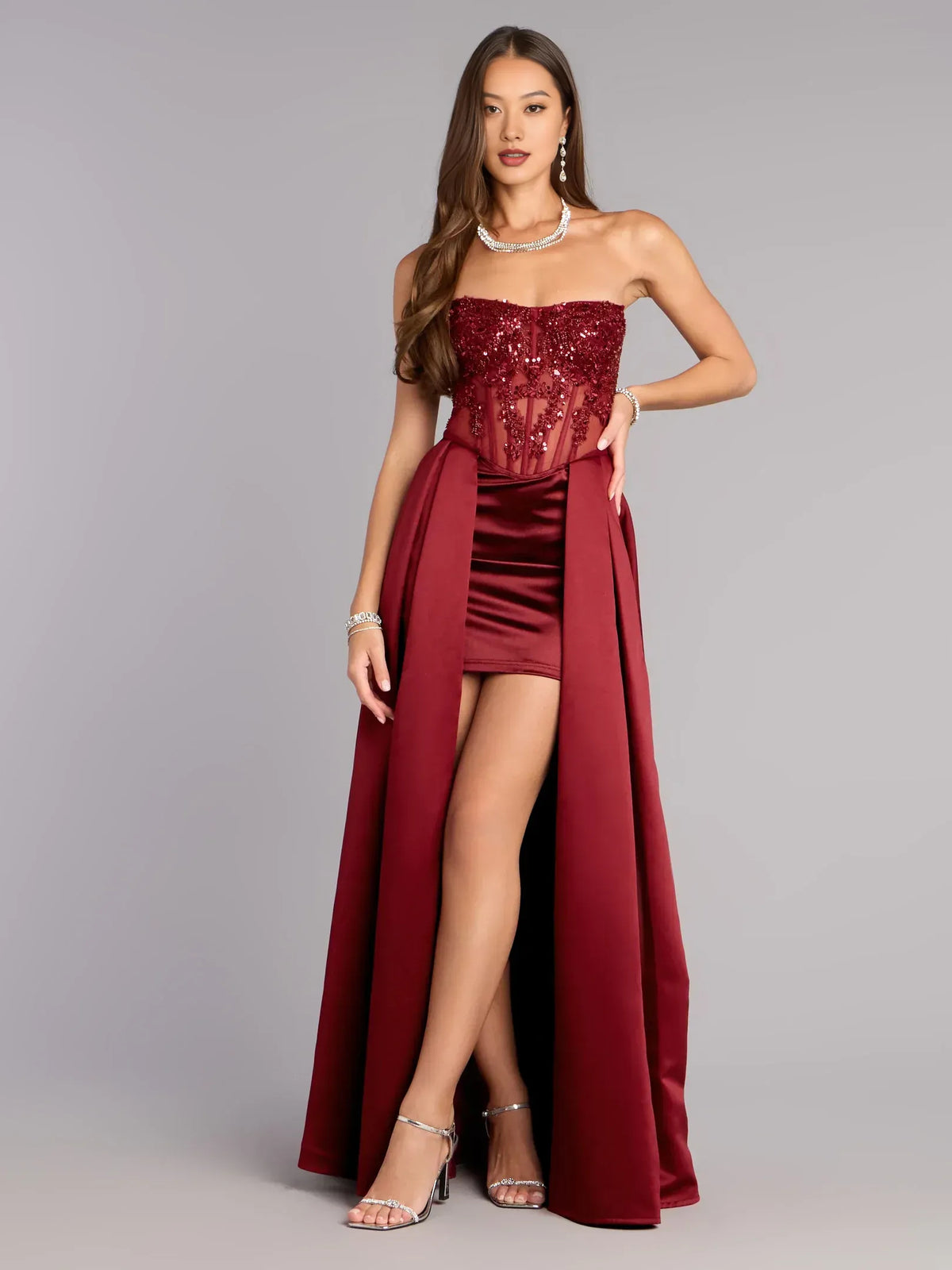 Burgundy a-line mini formal dress with strapless neckline, full-length front view