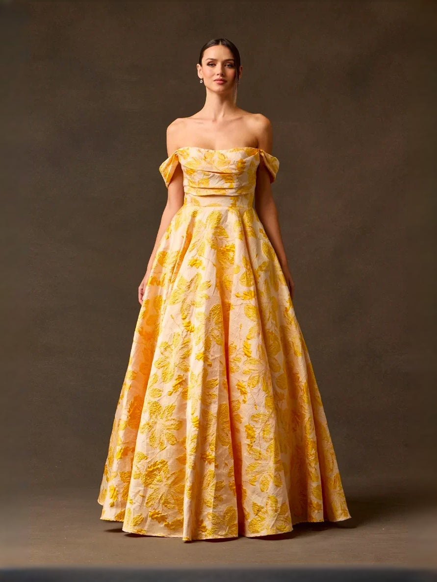Yellow maxi prom dress, front view showing the a-line silhouette