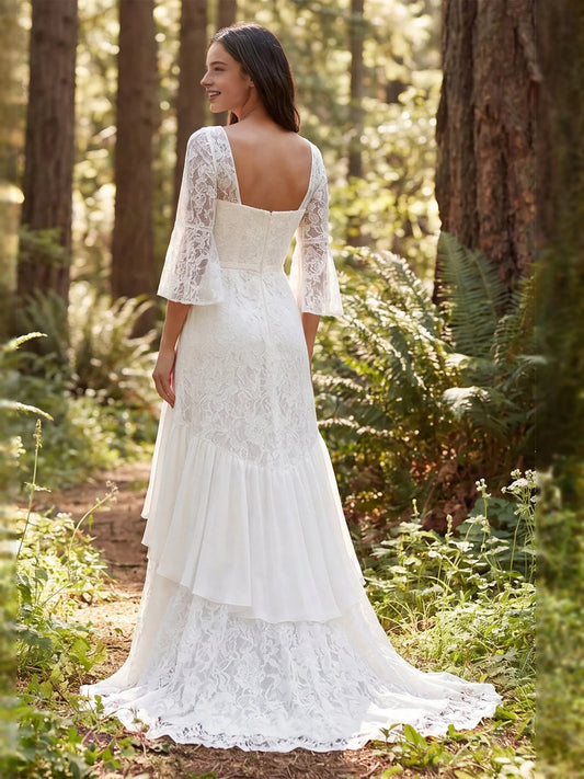 Ivory floor-length wedding dress, front view showing the mermaid silhouette