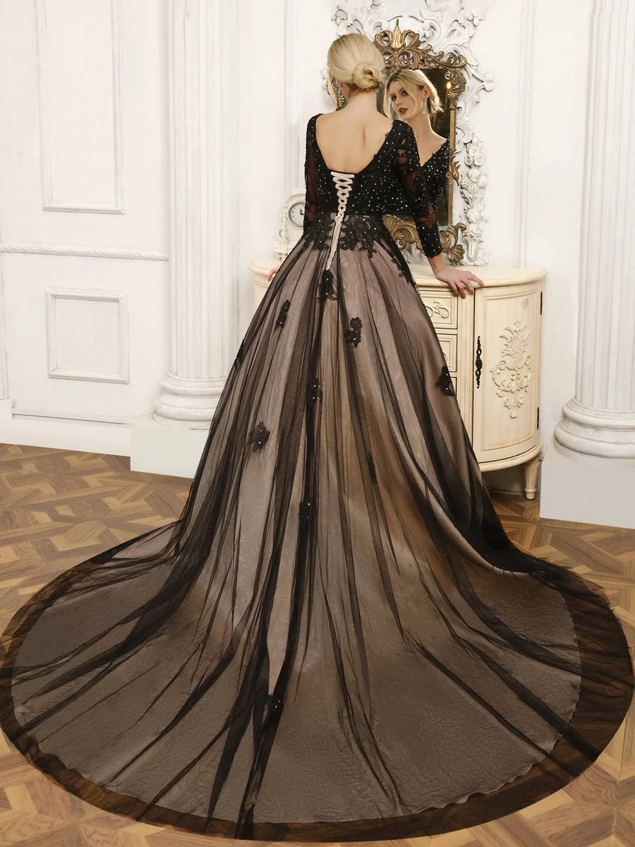 Black floor-length wedding dress, front view showing the a-line silhouette