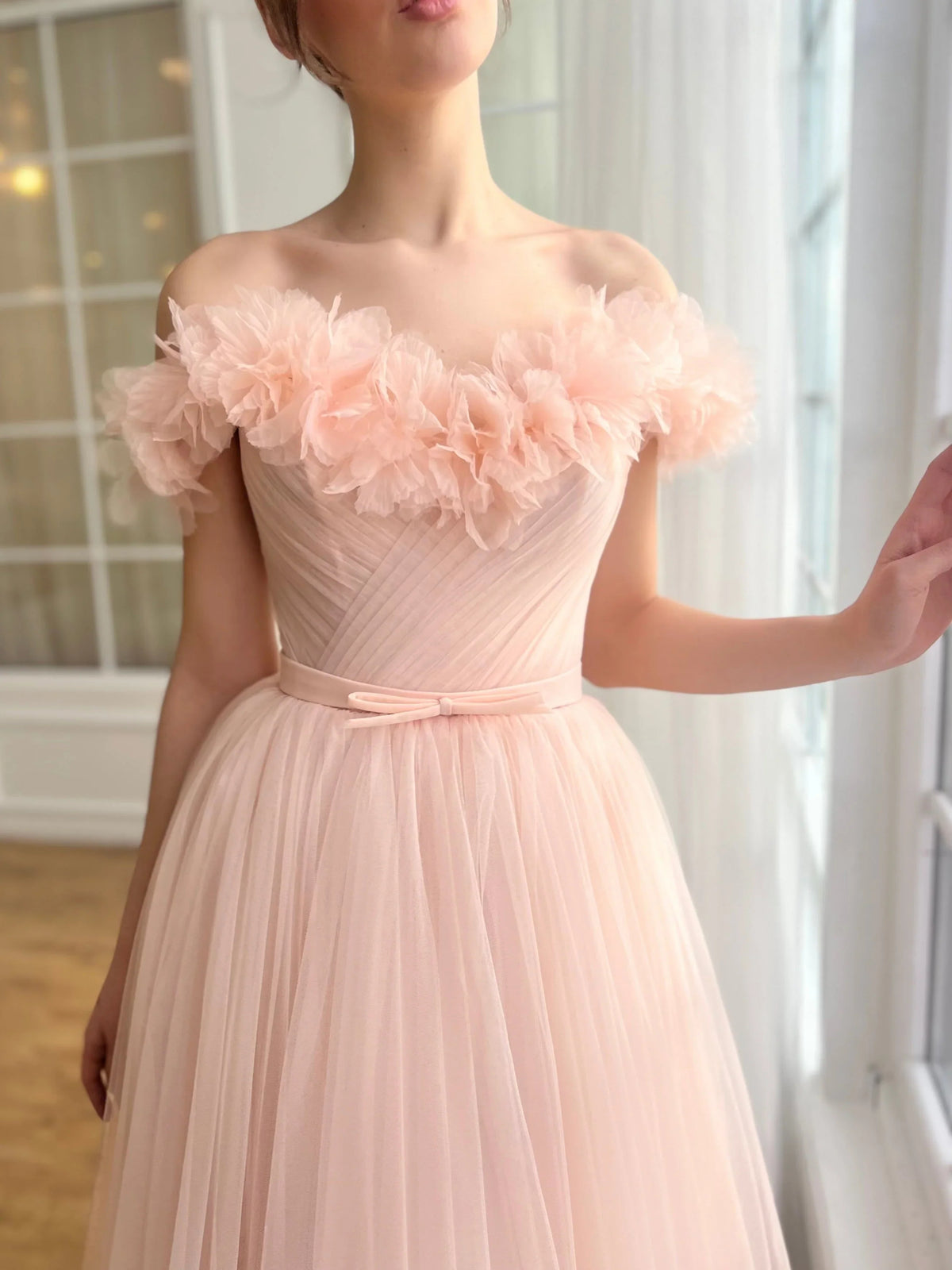 Peach midi prom dress, front view showing the a-line silhouette
