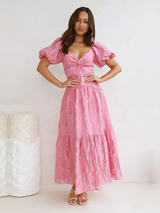 Pink a-line maxi formal dress with V-neckline, full-length front view