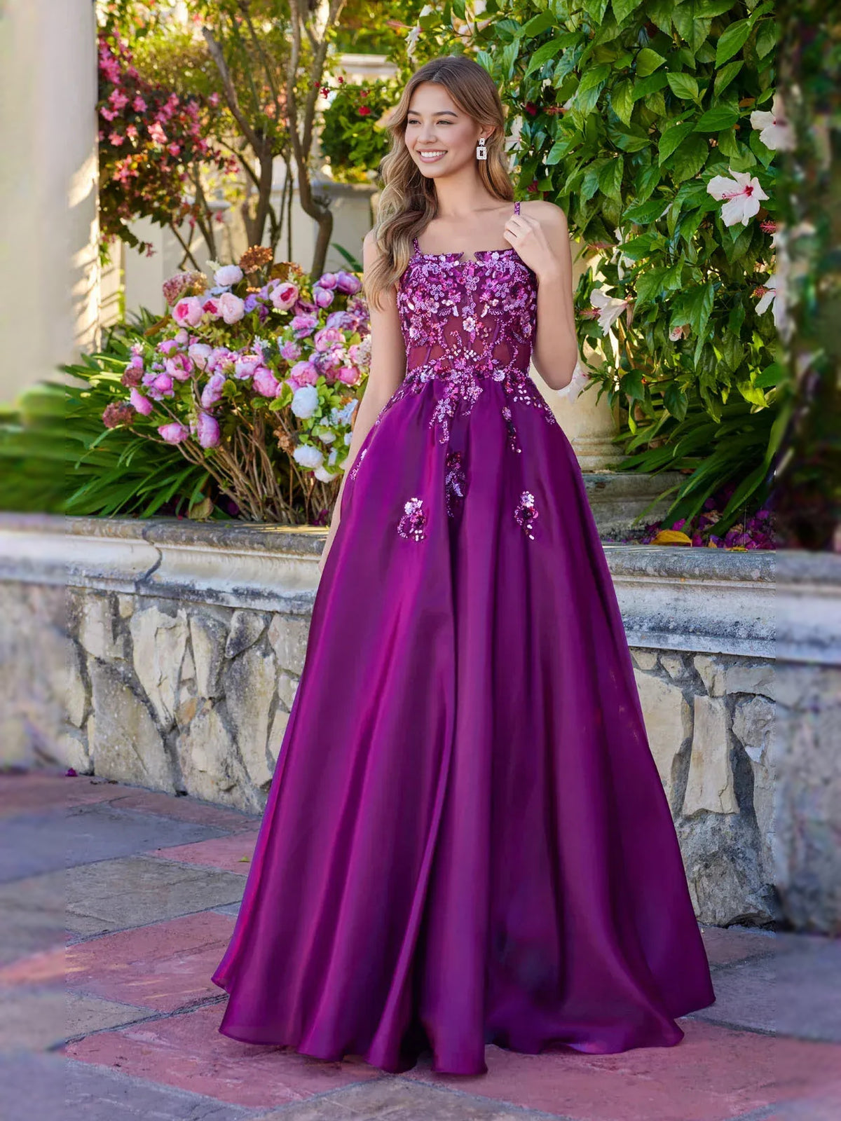 Purple floor-length prom dress, front view showing the a-line silhouette