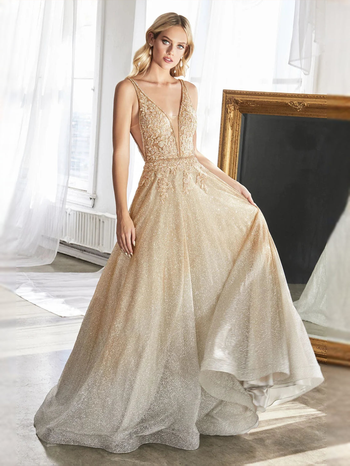 Champagne floor-length prom dress, front view showing the a-line silhouette
