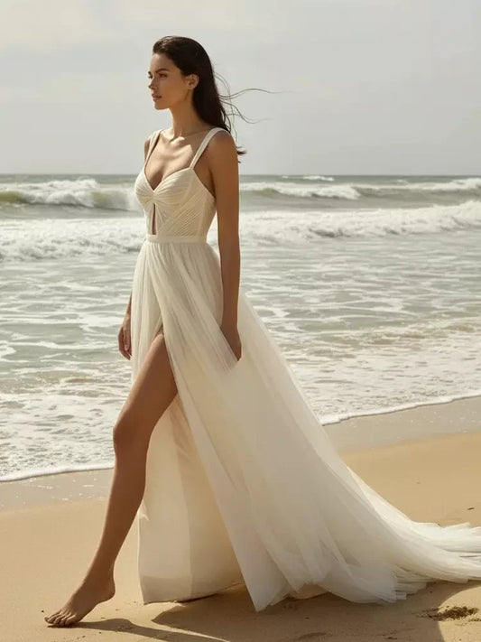Ivory floor-length wedding dress, front view showing the a-line silhouette