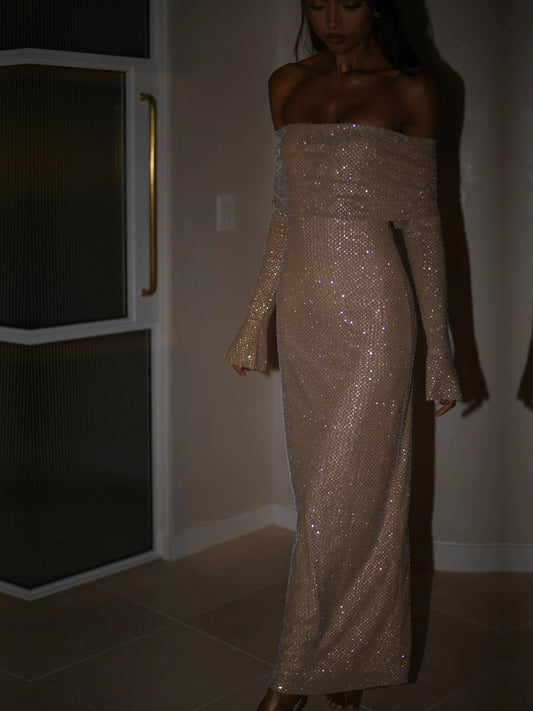 Nude sheath maxi formal dress with off-the-shoulder neckline, full-length front view