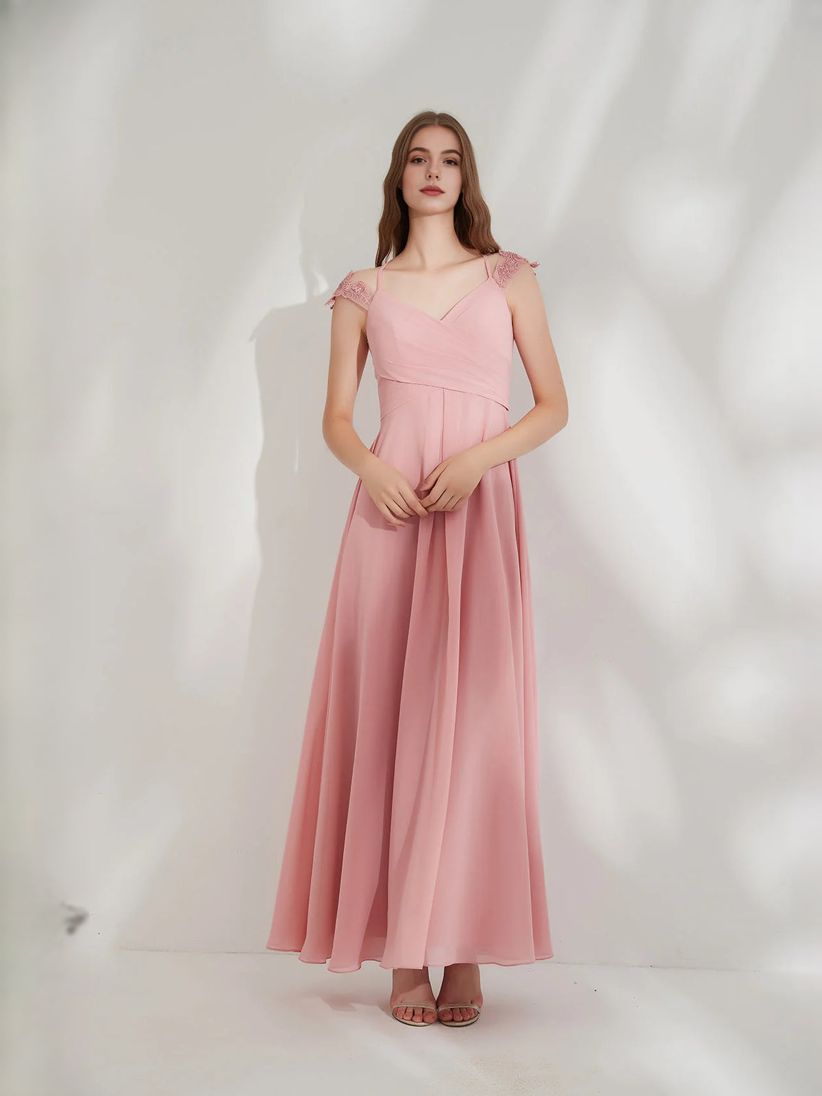 Pink floor-length bridesmaid dress, front view showing the a-line silhouette