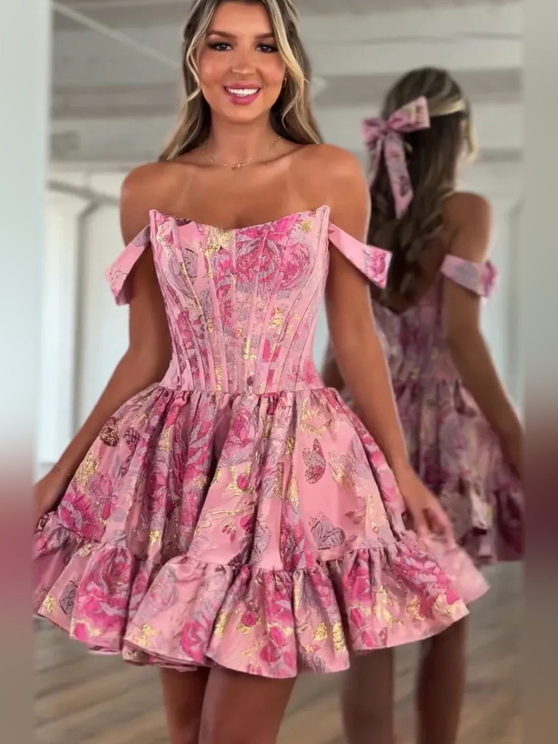 Floral mini homecoming dress, alternate view showing the full-length silhouette