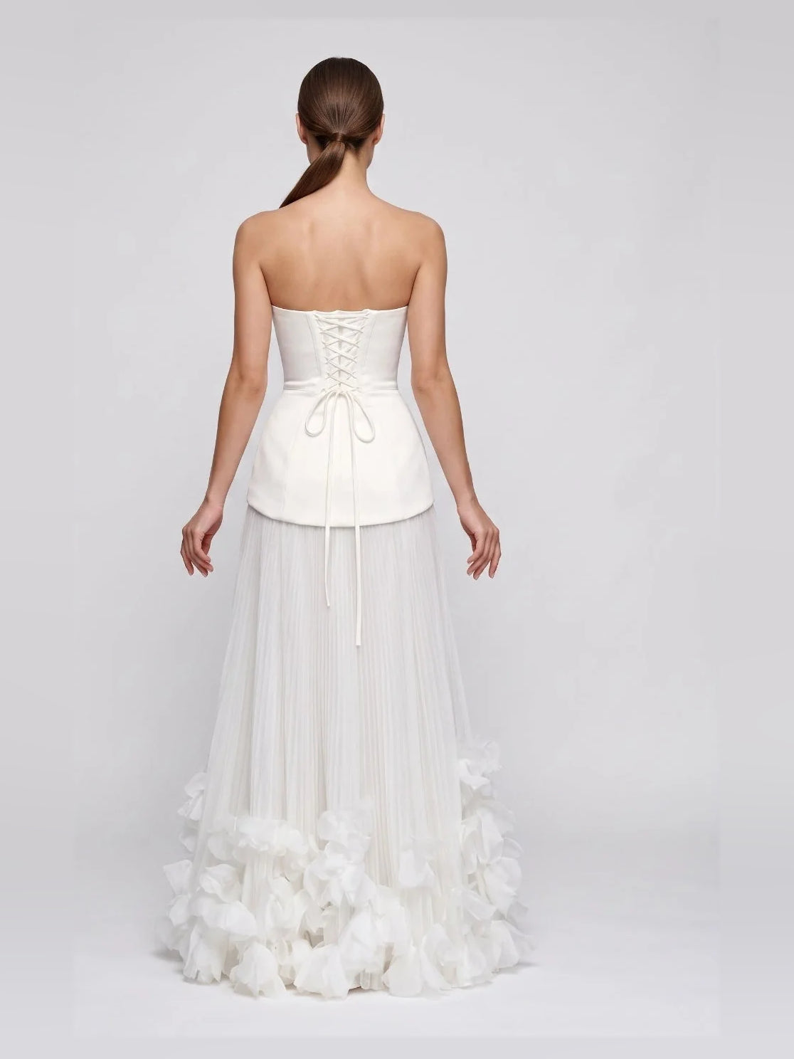 Ivory floor-length wedding dress, front view showing the a-line silhouette