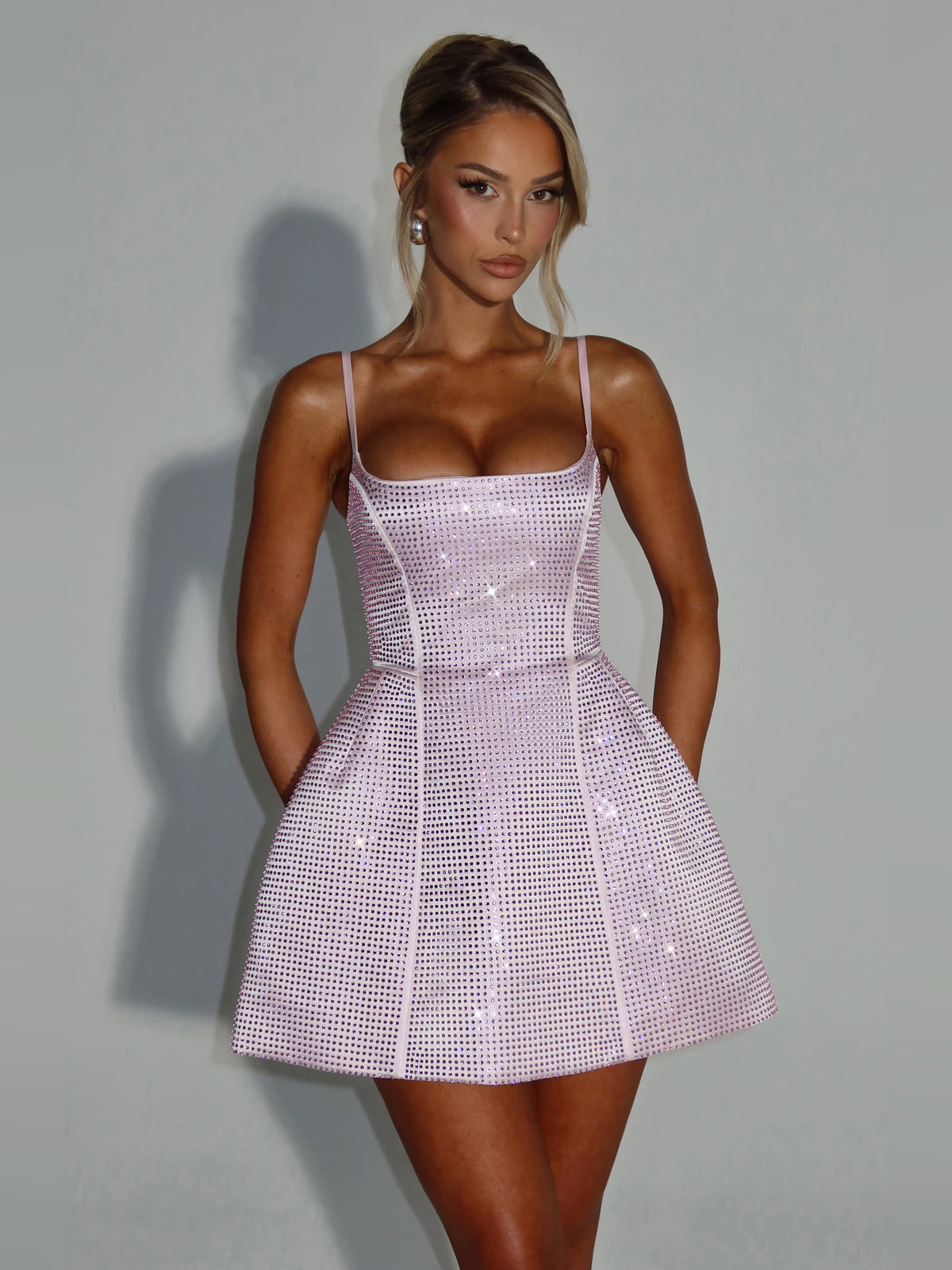 Blush mini homecoming dress, front view showing the silhouette