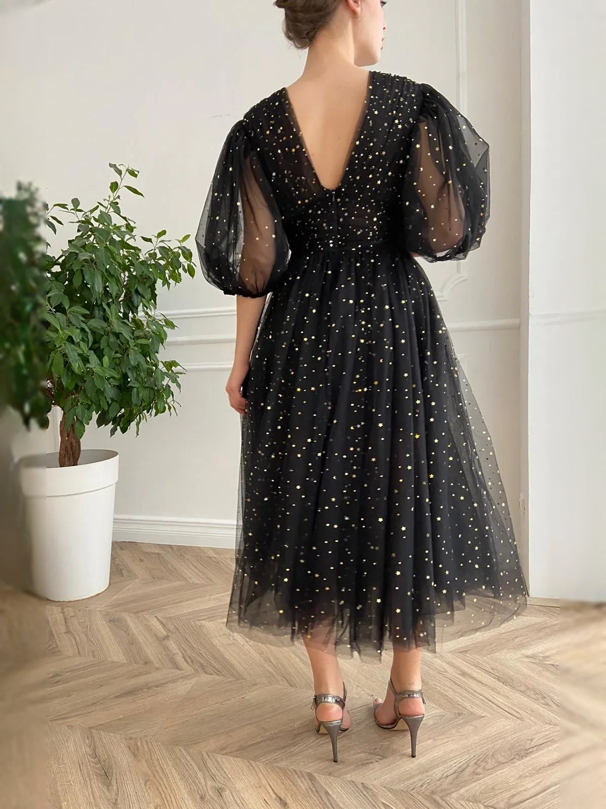 Black midi prom dress, front view showing the a-line silhouette