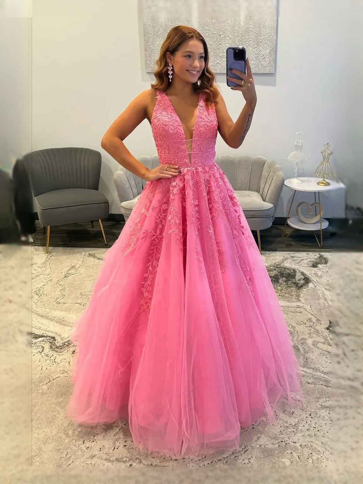 Pink floor-length prom dress, front view showing the a-line silhouette