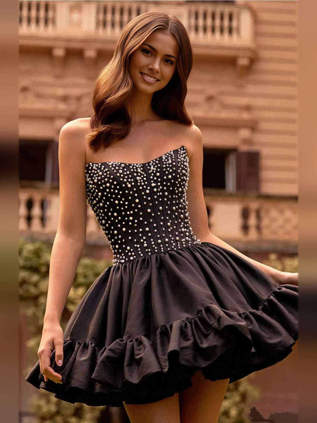 Black mini homecoming dress, alternate view showing the full-length silhouette