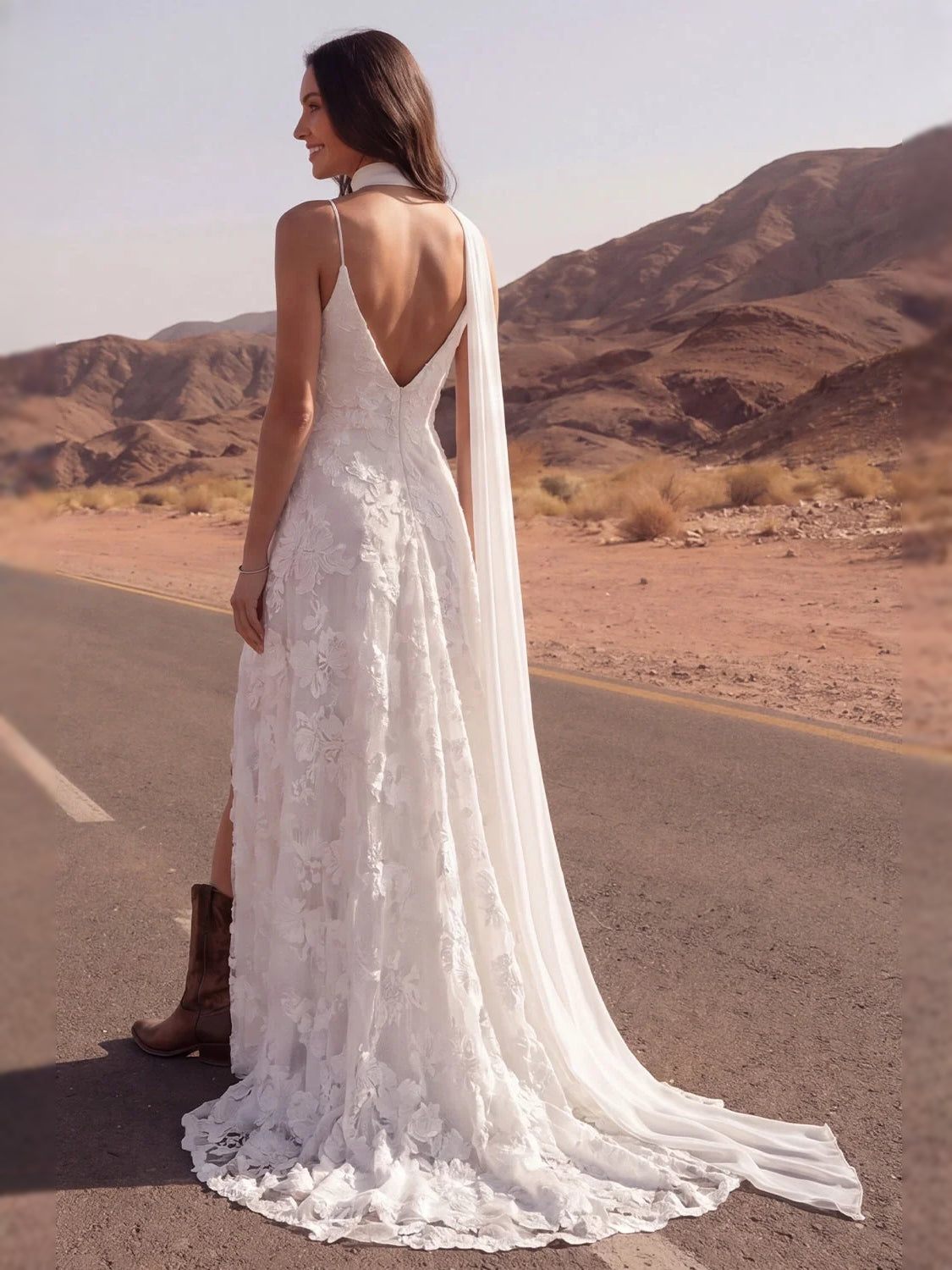 Ivory floor-length wedding dress, front view showing the a-line silhouette