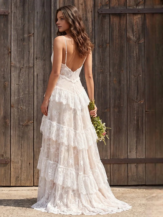 Ivory floor-length wedding dress, front view showing the a-line silhouette