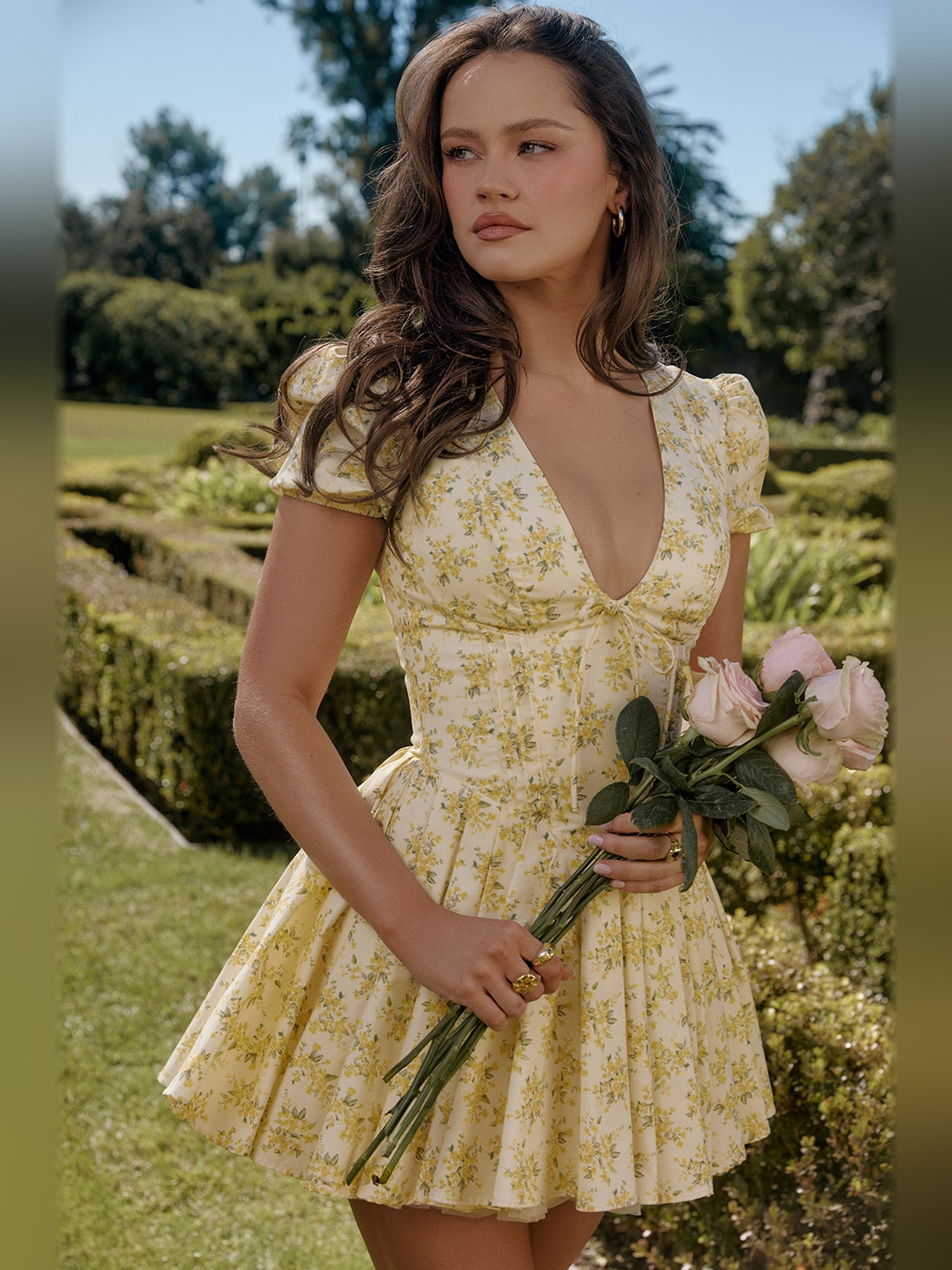 Floral mini homecoming dress, front view showing the silhouette