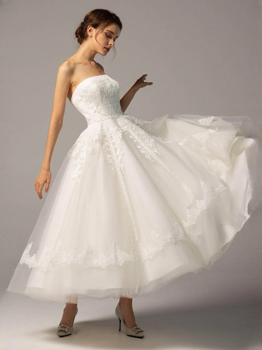 Ivory short wedding dress, front view showing the a-line silhouette