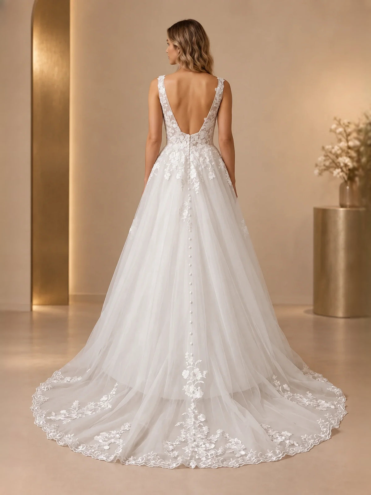 Ivory floor-length wedding dress, front view showing the a-line silhouette