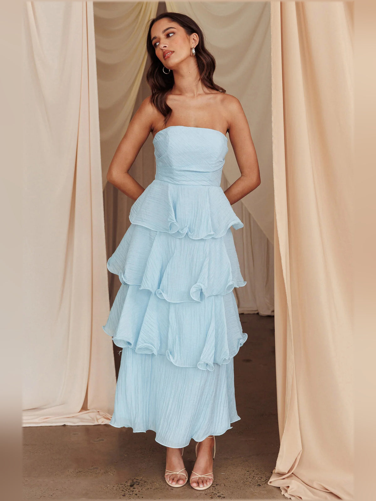 Blue midi formal dress with strapless neckline, full-length front view