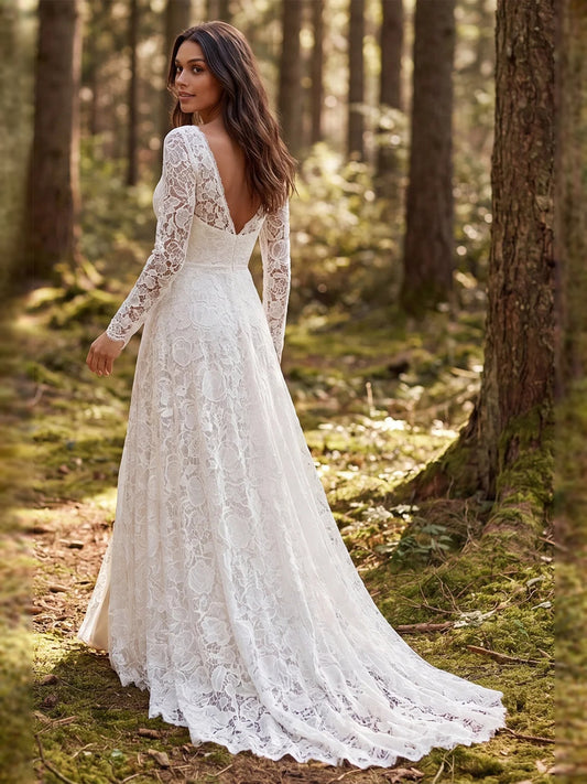 Ivory floor-length wedding dress, front view showing the a-line silhouette