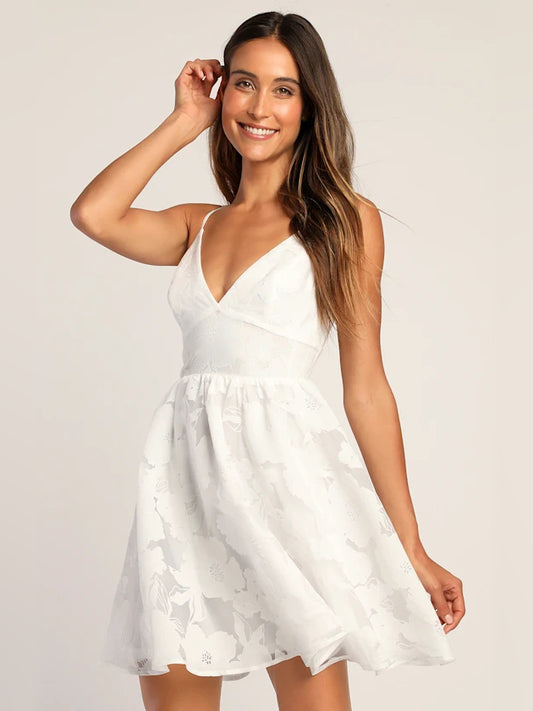 White Floral mini homecoming dress, front view showing the silhouette