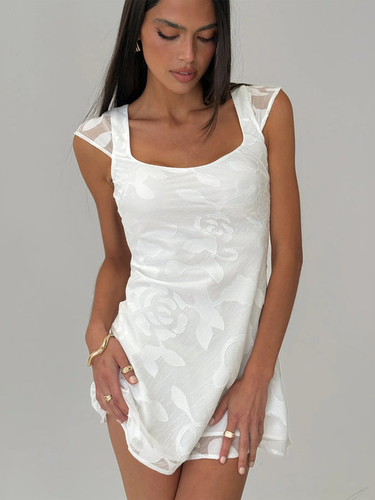 White Floral mini homecoming dress, front view showing the silhouette