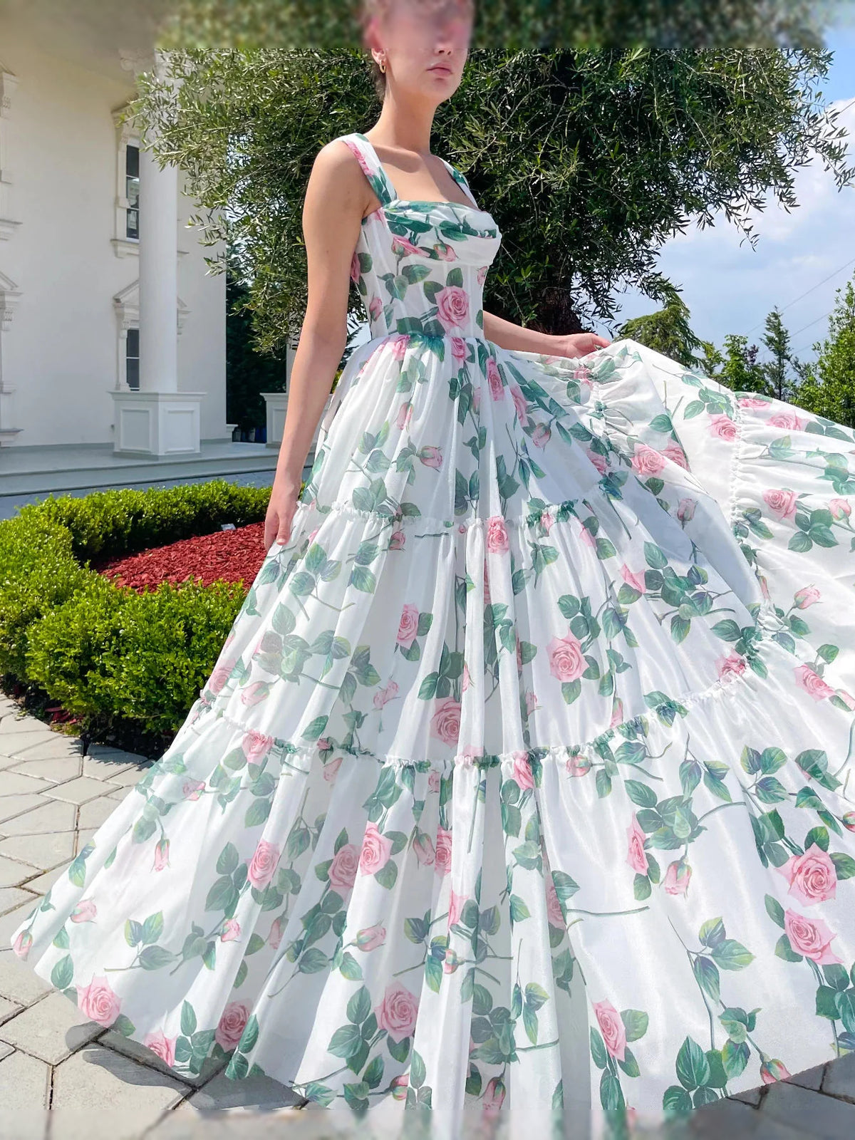 Floral maxi prom dress, front view showing the a-line silhouette