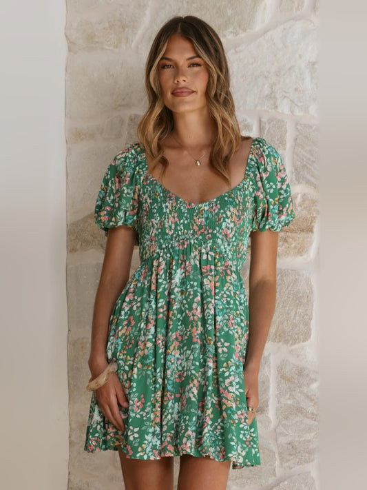 Green Floral mini homecoming dress, front view showing the silhouette