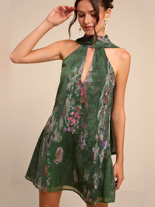 Green mini homecoming dress, front view showing the a-line silhouette