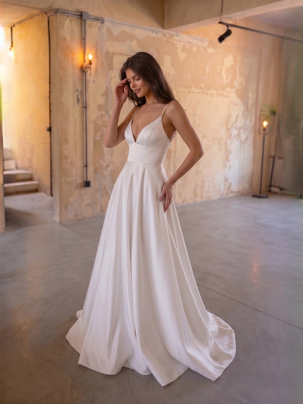 Ivory floor-length wedding dress, front view showing the a-line silhouette