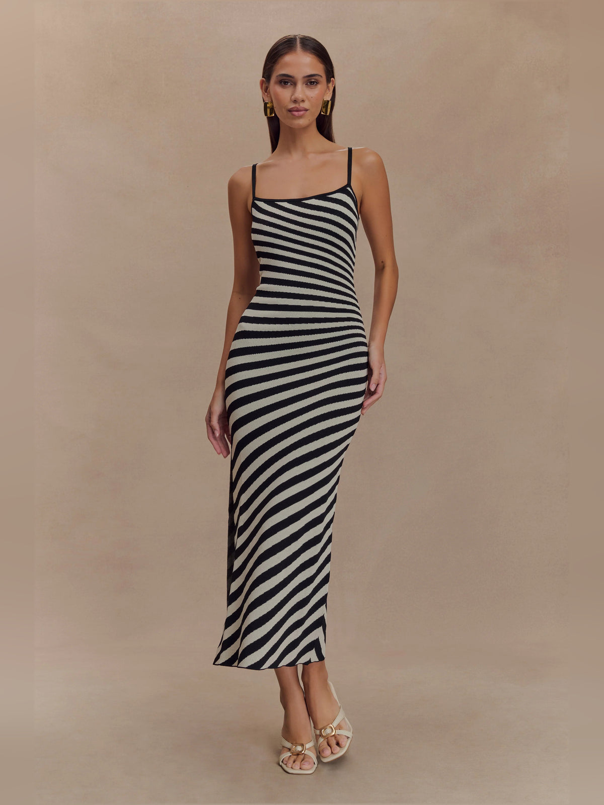 White midi formal dress with printed pattern, full-length front view